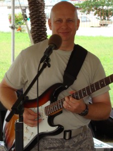 MSGT T.C. Cottrell plays a great guitar during an audience in St. John's, Antigua.