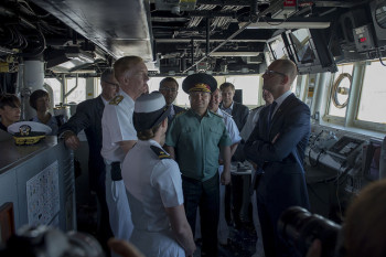 Prime Minister Yatsenuik meets Ensign Audrey Petro, Communicator, onboard USS Donald Cook