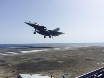 French Rafale fighter recovers aboard aircraft carrier Charles de Gaulle (R91) dropping ordnance on Da’esh targets in Syria. (Personal photo courtesy of Vice Adm. James Foggo III)