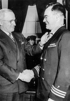 Chaplain O'Callahan is awarded the Medal of Honor by President Harry Truman at the White House, 23 January 1946